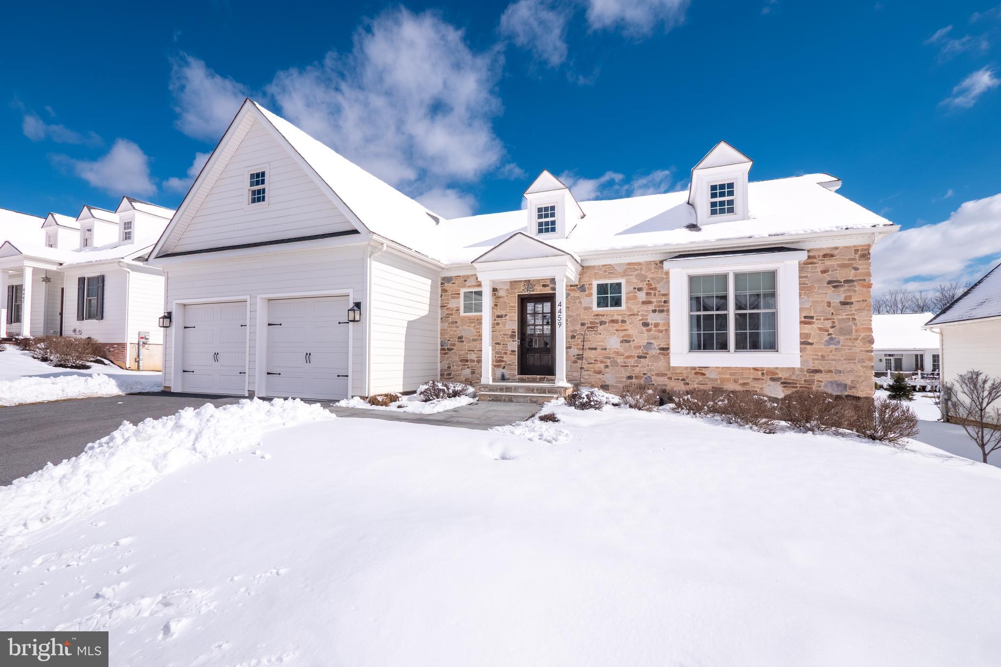 a front view of a house with a patio