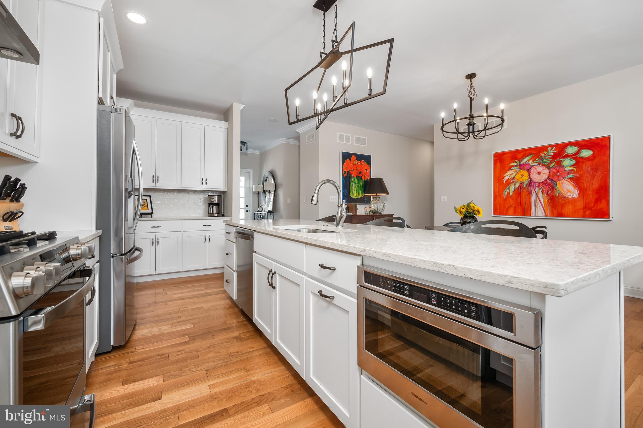 4459 Old Saucon Road Bethlehem, PA 18015 - Photo 16 of 39 a kitchen with stainless steel appliances a stove refrigerator and cabinets