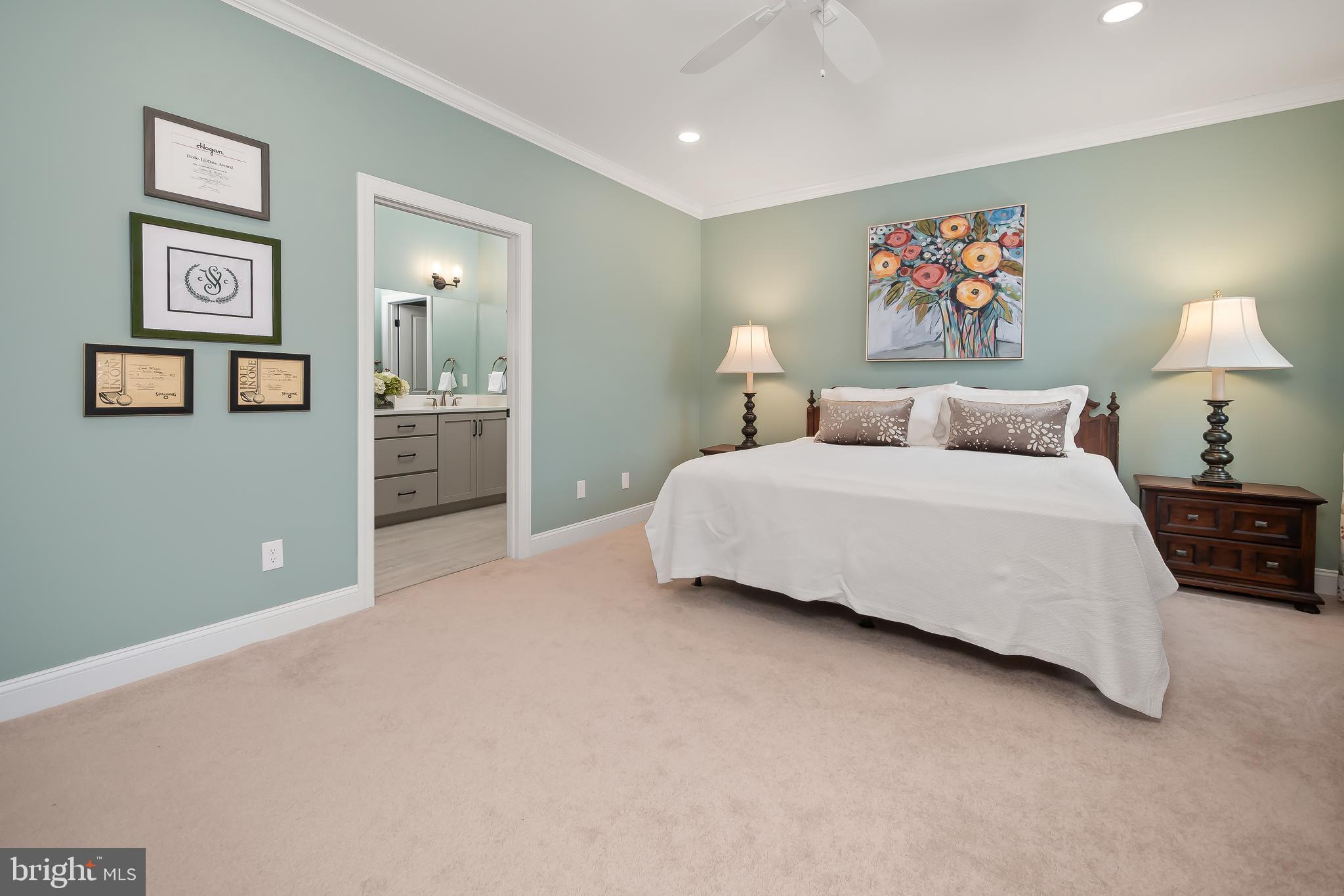 4459 Old Saucon Road Bethlehem, PA 18015 - Photo 21 of 39 a bedroom with a bed and a chandelier