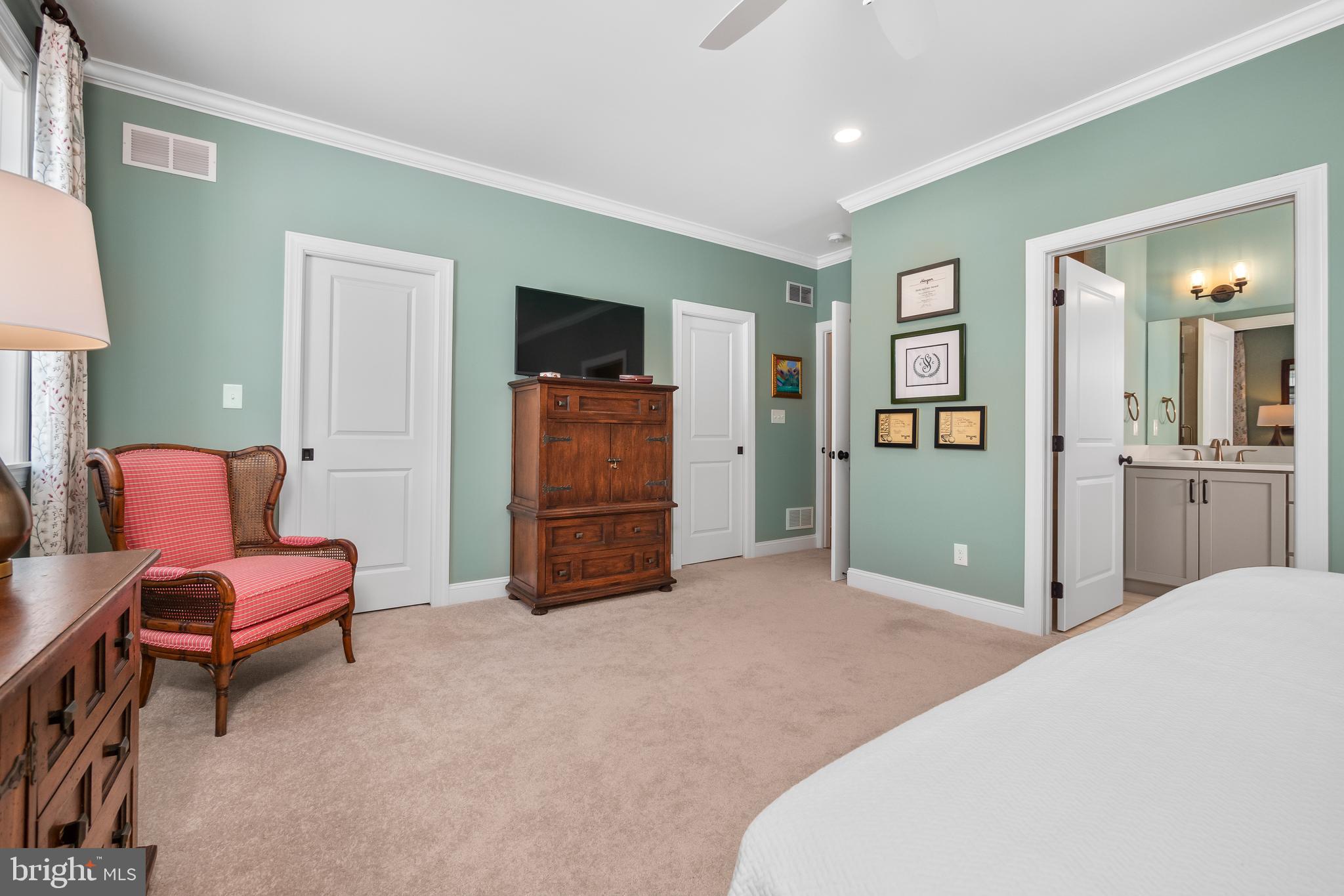 4459 Old Saucon Road Bethlehem, PA 18015 - Photo 22 of 39 a bedroom with furniture and a flat screen tv