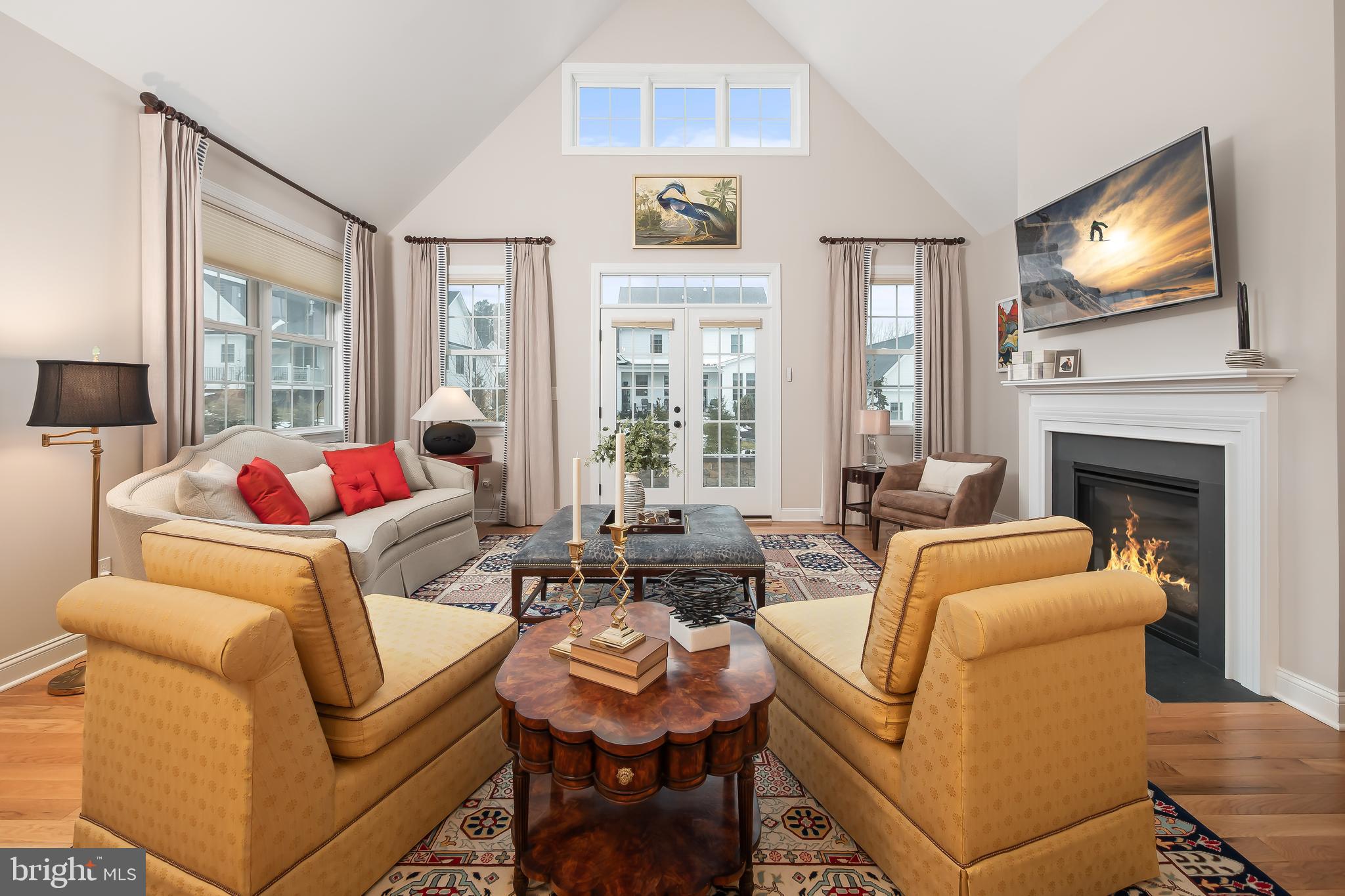 4459 Old Saucon Road Bethlehem, PA 18015 - Photo 8 of 39 a living room with fireplace furniture and a flat screen tv