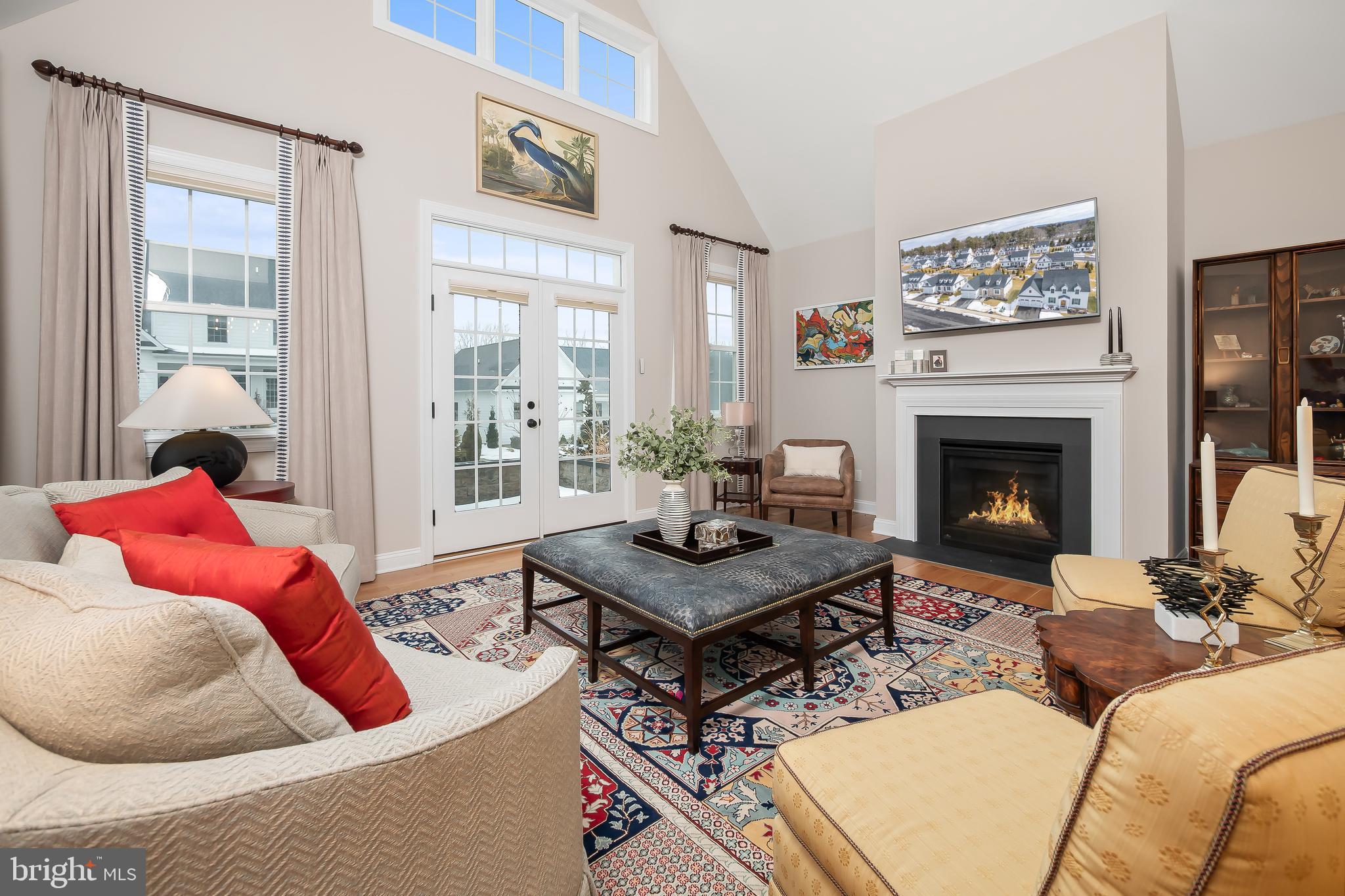4459 Old Saucon Road Bethlehem, PA 18015 - Photo 9 of 39 a living room with furniture and a fireplace