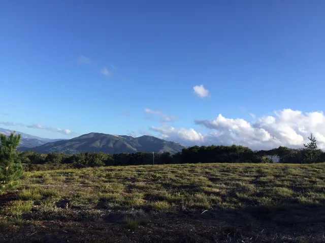 a view of lake and mountain