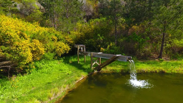 a view of a lake with mountain in the background