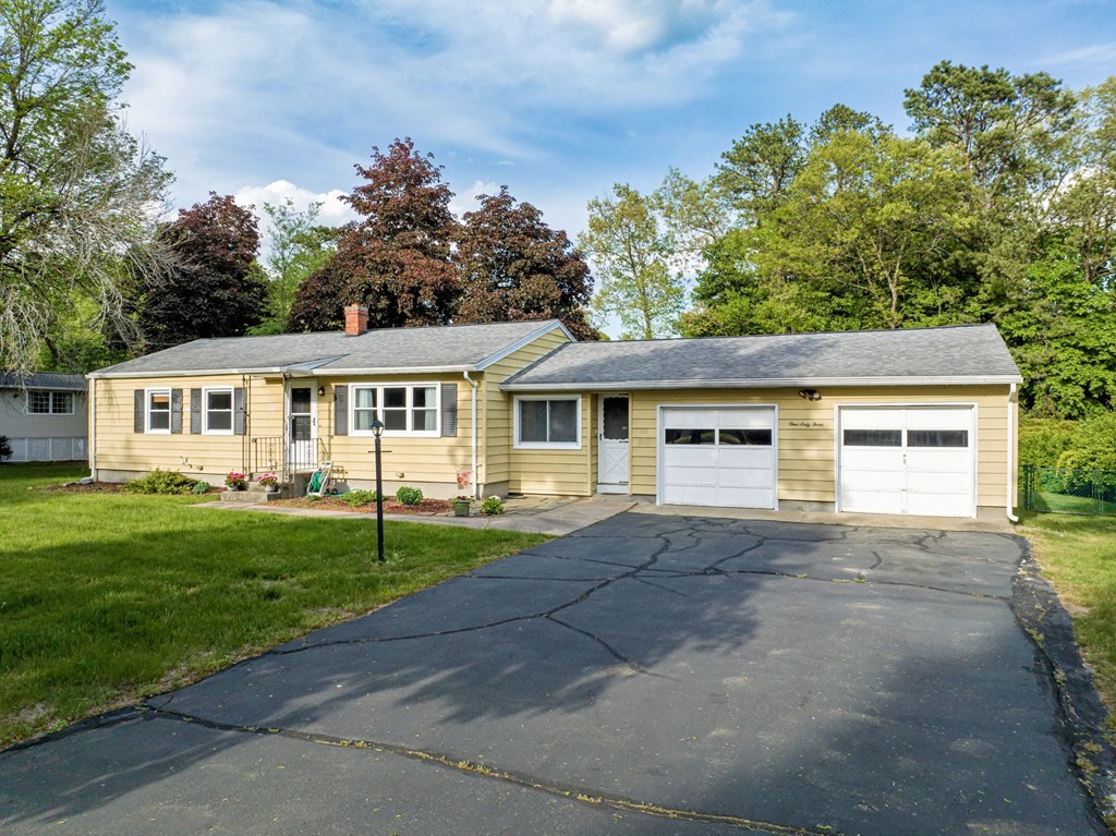 163 Cedar Road Longmeadow, MA 01106 - Photo 1 of 39 a front view of house with yard and green space