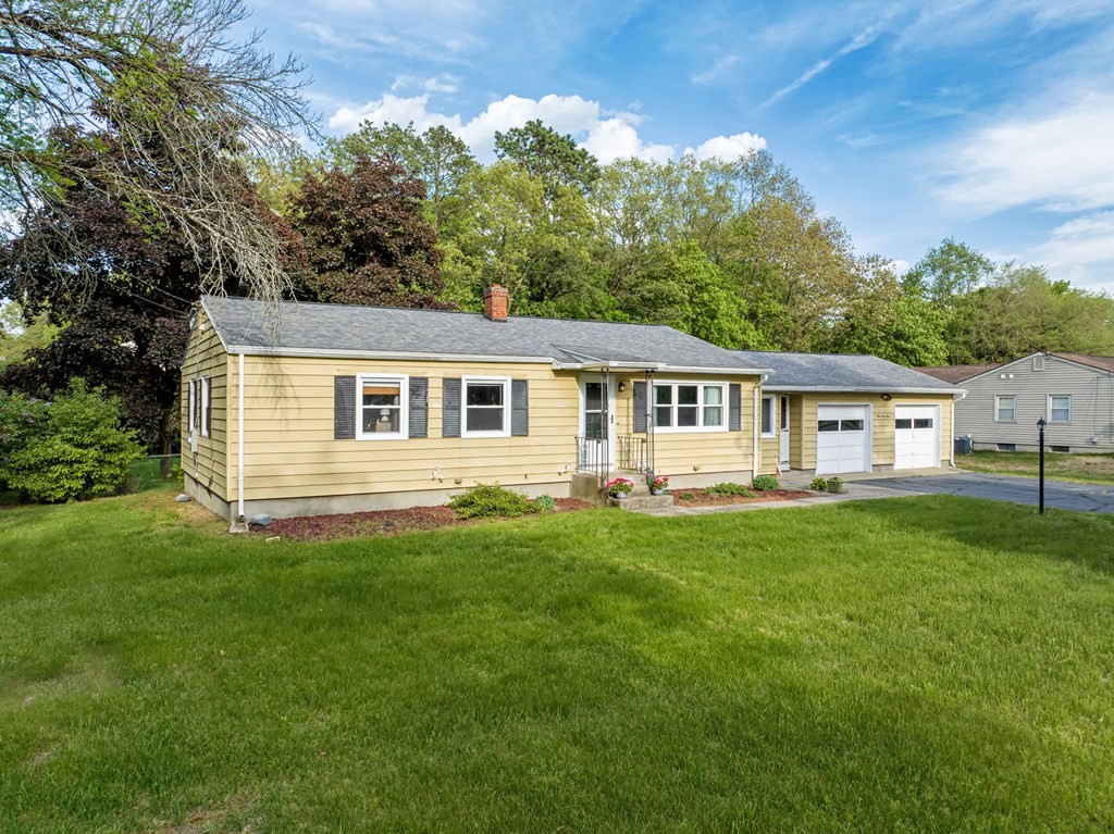 163 Cedar Road Longmeadow, MA 01106 - Photo 2 of 39 a view of a house with a backyard