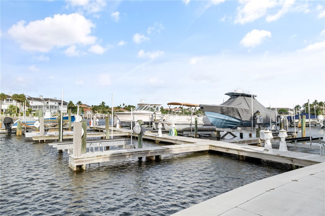 1875 Bay Road, Unit 215H Vero Beach, FL 32963 - Photo 27 of 36 a view of houses with outdoor space