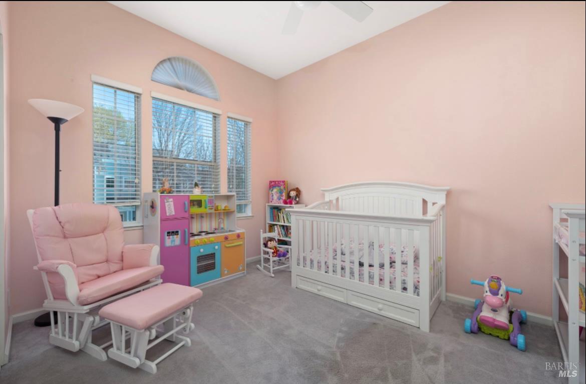 605 Laurel Grove Circle Santa Rosa, CA 95407 - Photo 3 of 29 a bedroom with a bed and a window