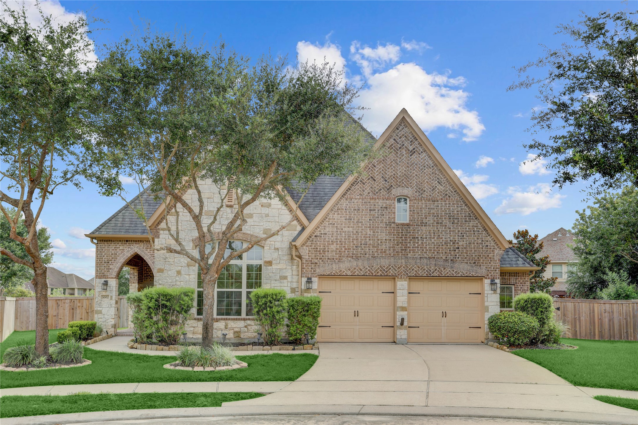 3002 Currant Drive Manvel, TX 77578 - Photo 1 of 43 front view of a house with a yard