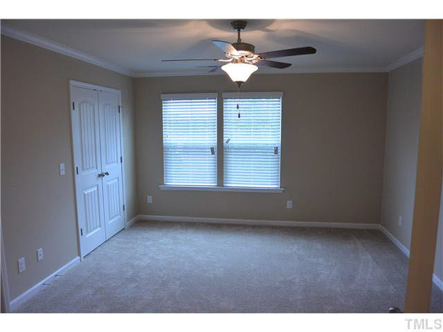 5009 Lalex Lane Cary, NC 27519 - Photo 11 of 15 a view of an empty room with a window