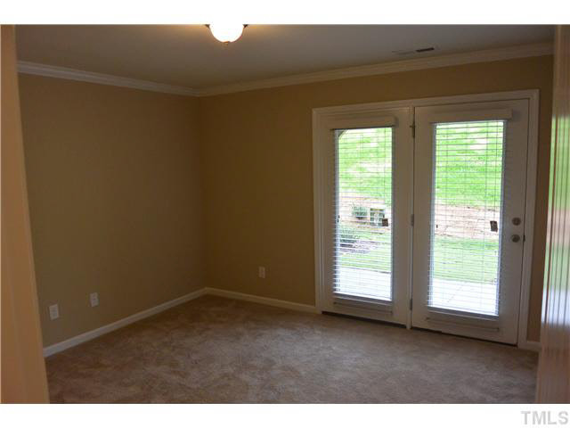 5009 Lalex Lane Cary, NC 27519 - Photo 7 of 15 a room that has a window in it