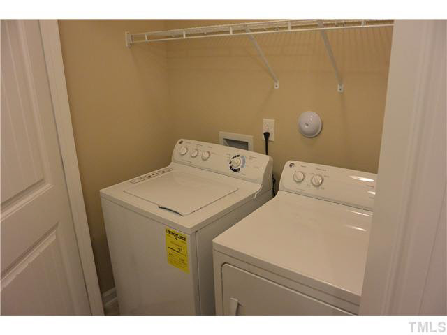 5009 Lalex Lane Cary, NC 27519 - Photo 10 of 15 a utility room with dryer and washer