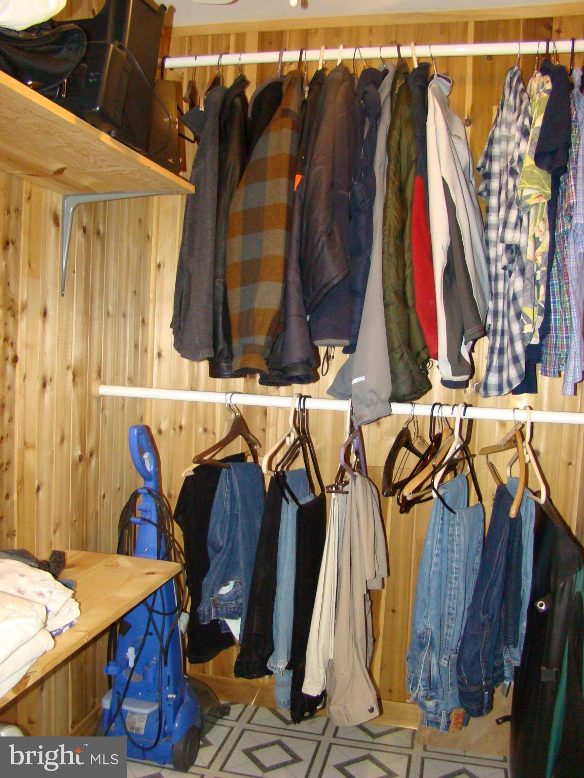 3100 Ross Road St. Leonard, MD 20685 - Photo 13 of 23 a view of walk in closet with clothes