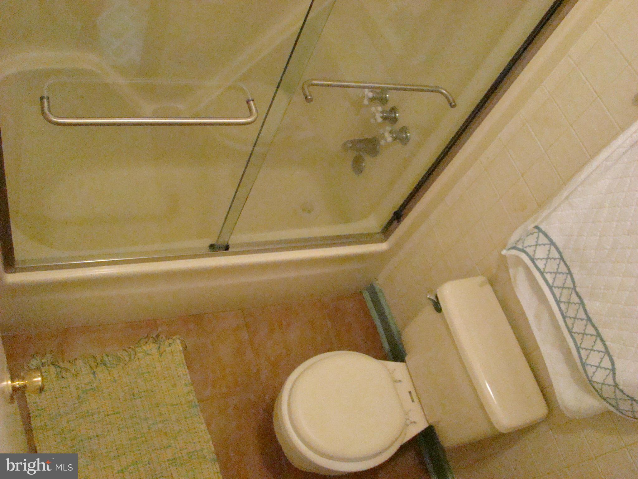 3100 Ross Road St. Leonard, MD 20685 - Photo 15 of 23 a bathroom with a toilet and a shower
