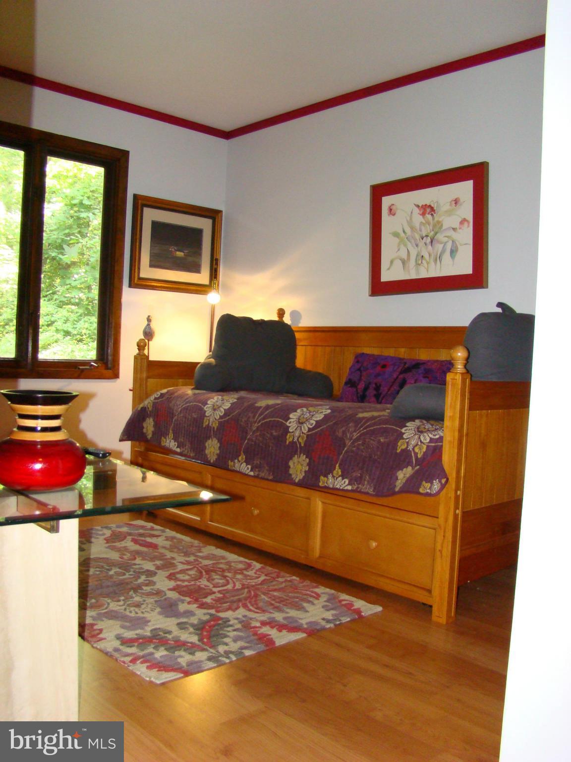 3100 Ross Road St. Leonard, MD 20685 - Photo 16 of 23 a living room with furniture and a large window