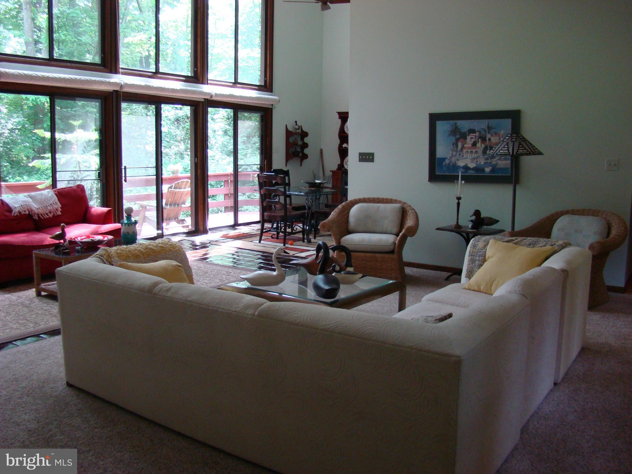 3100 Ross Road St. Leonard, MD 20685 - Photo 7 of 23 a living room with furniture and a large window