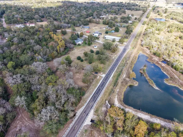 a view of a yard from a balcony