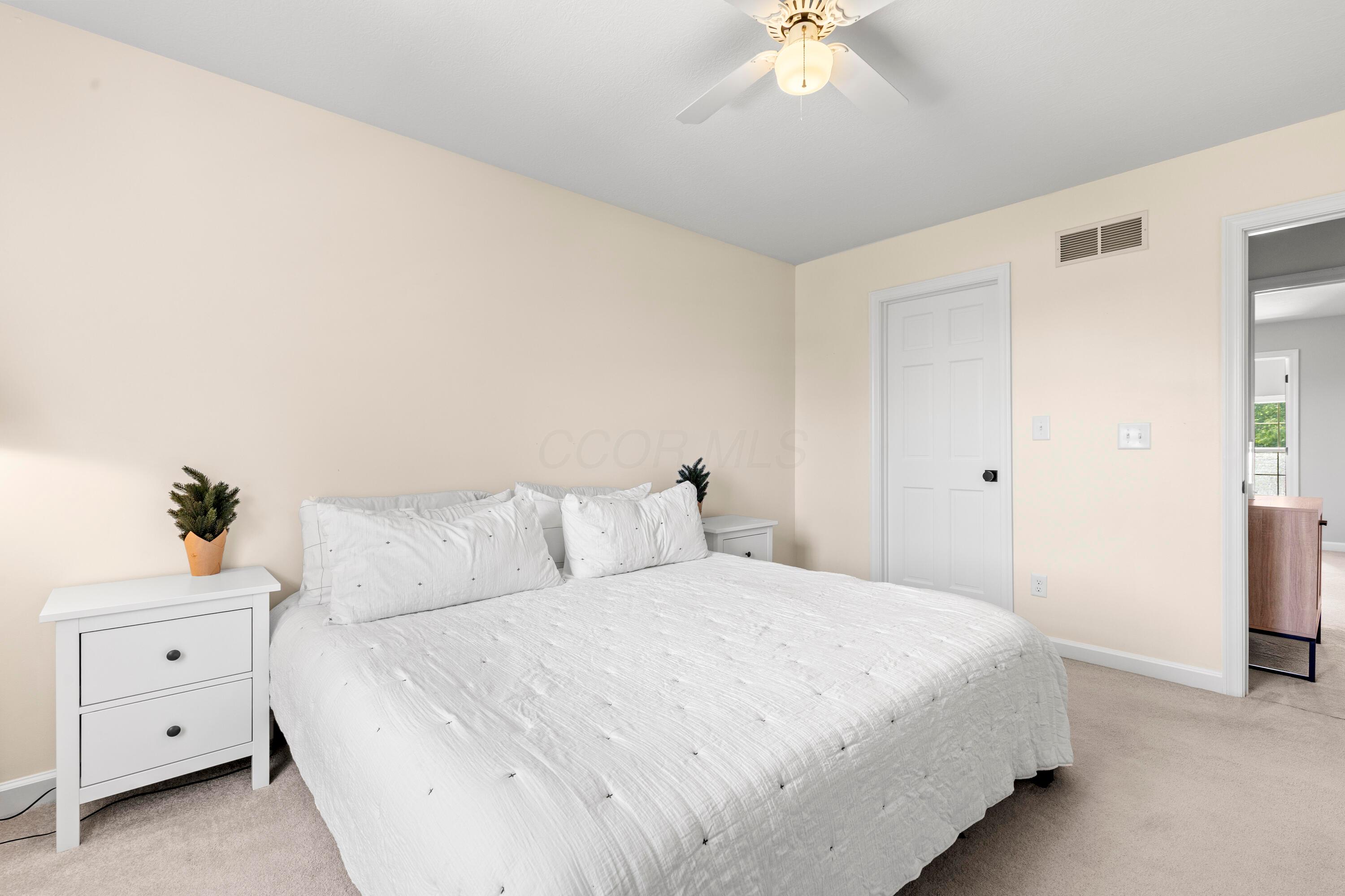1515 Dale Ford Road Delaware, OH 43015 - Photo 43 of 74 • Light sand carpet • Ivory painted walls • Lighted ceiling fan