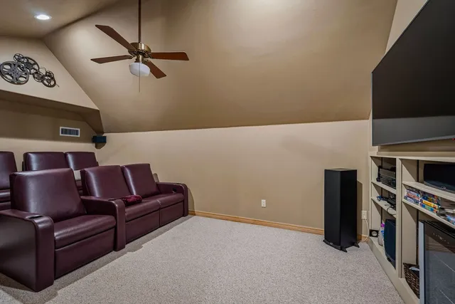 a view of a swimming pool with a patio and a yard