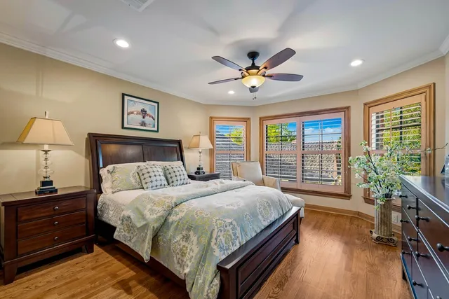 a view of a house with porch and garden