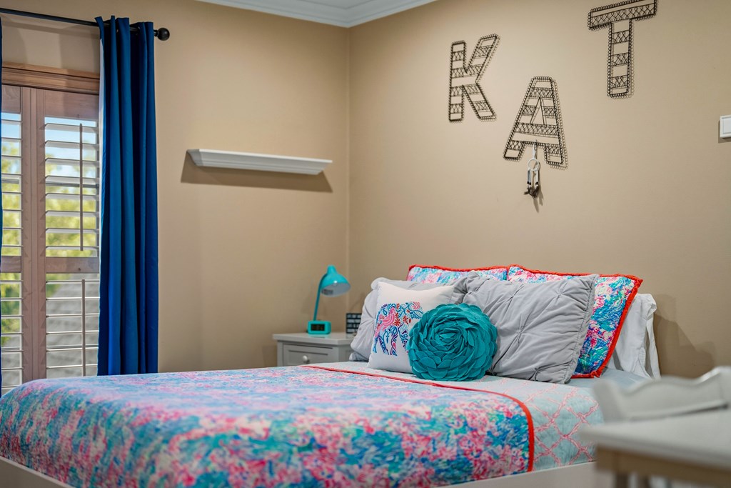 2409 West Commerce Street San Saba, TX 76877 - Photo 36 of 96 a bedroom with a bed and window