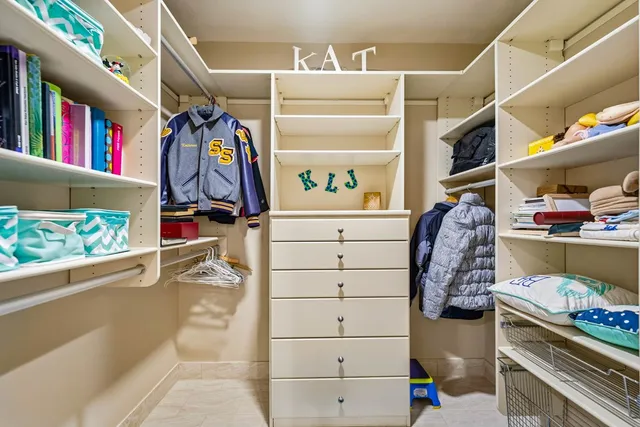 a view of a livingroom with furniture hardwood floor and a flat screen tv