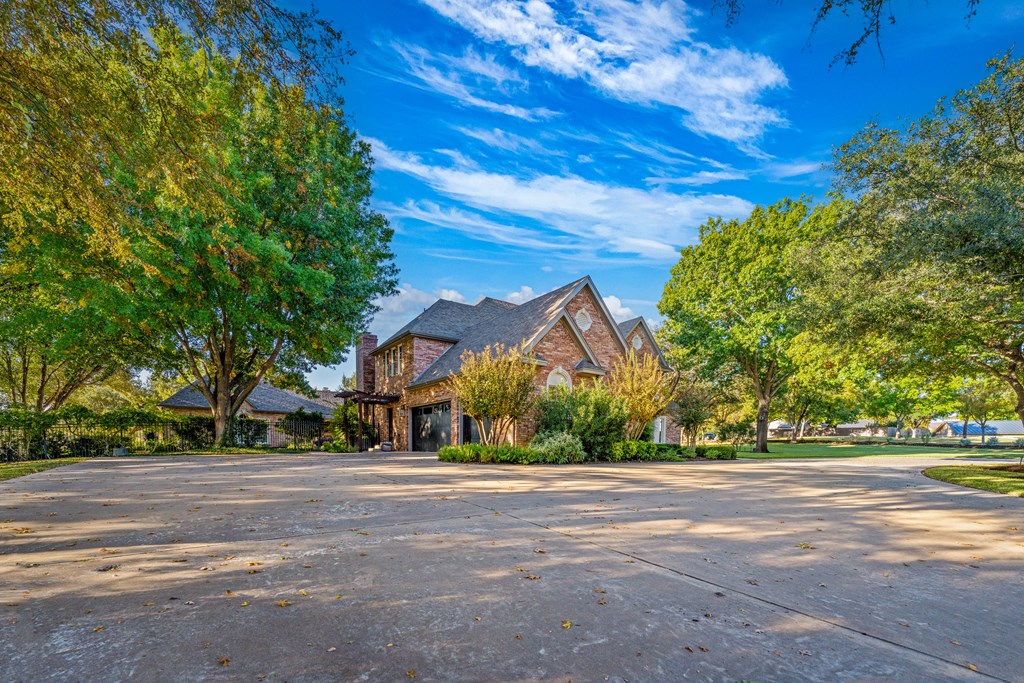 2409 West Commerce Street San Saba, TX 76877 - Photo 46 of 96 a front view of a house with a yard