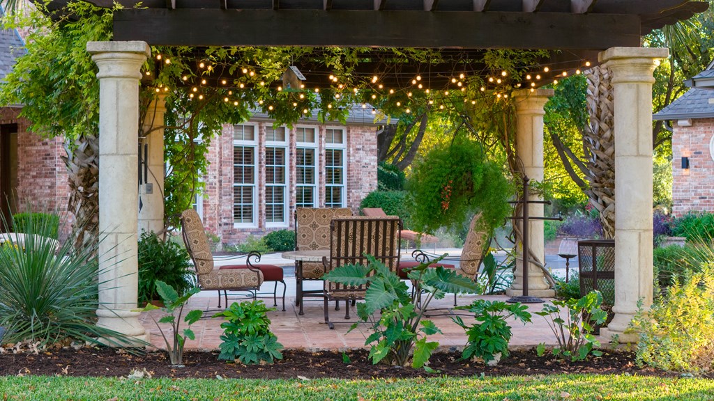 2409 West Commerce Street San Saba, TX 76877 - Photo 54 of 96 a view of a house with porch and garden