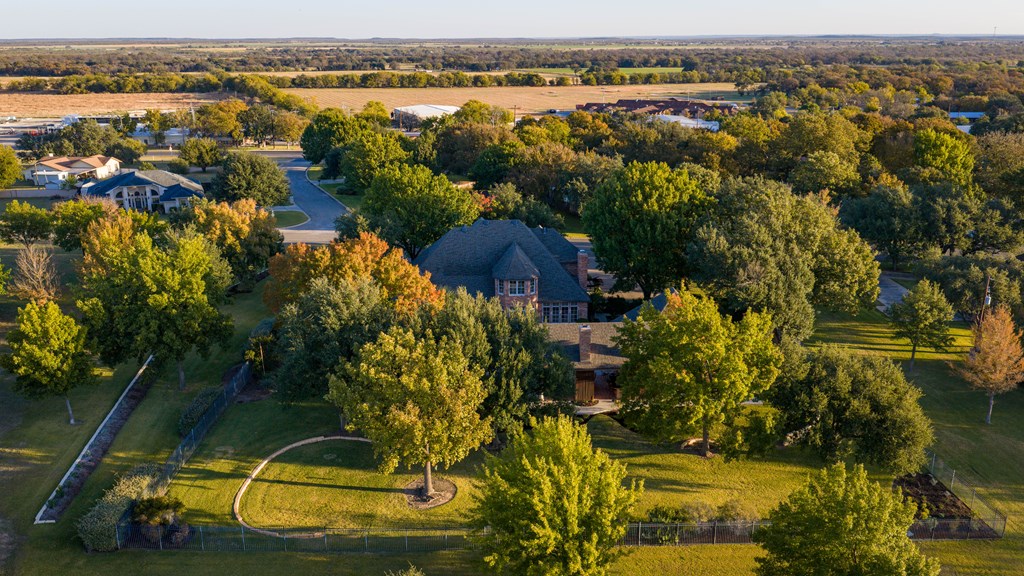 2409 West Commerce Street San Saba, TX 76877 - Photo 79 of 96 an aerial view of residential houses with outdoor space and swimming pool