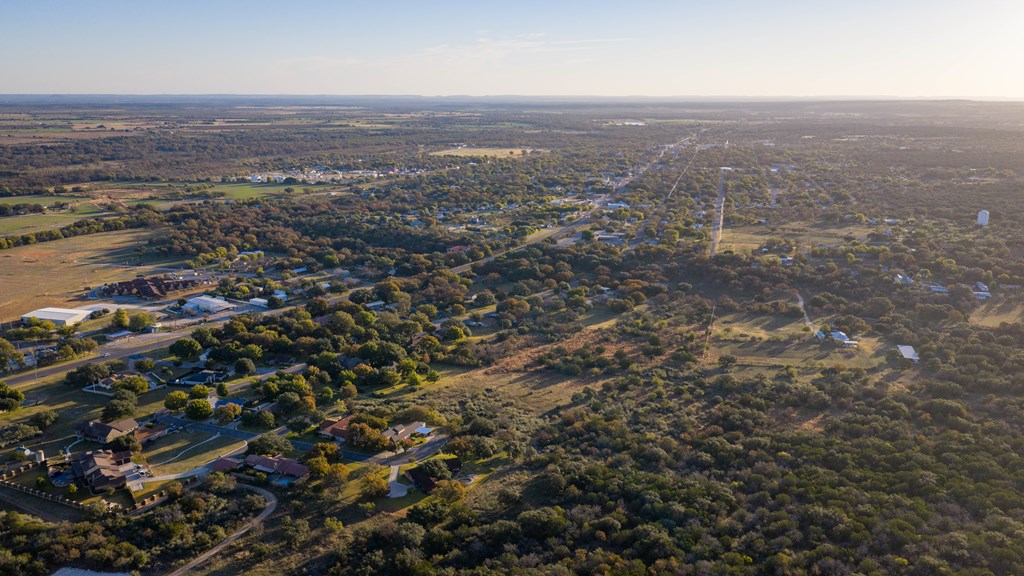 2409 West Commerce Street San Saba, TX 76877 - Photo 86 of 96 an aerial view of house with yard and mountain view in back