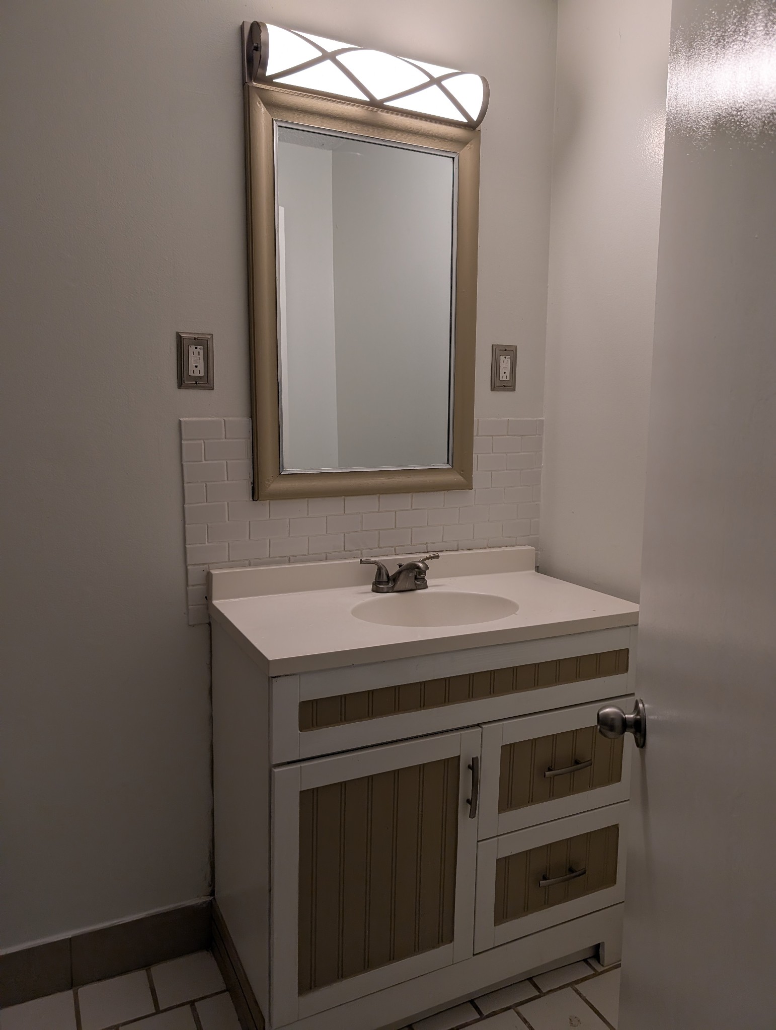 441 Harding Place, Unit B2 Nashville, TN 37211 - Photo 12 of 12 a bathroom with a sink and a mirror