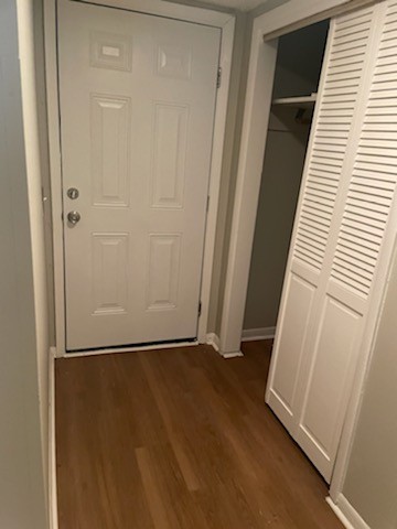 441 Harding Place, Unit B2 Nashville, TN 37211 - Photo 10 of 12 an empty room with wooden floor and windows