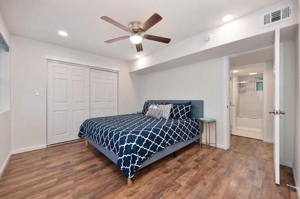 3191 Fort Jim Road Placerville, CA 95667 - Photo 11 of 30 a bedroom with a bed and a chandelier