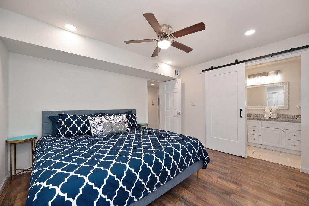 3191 Fort Jim Road Placerville, CA 95667 - Photo 12 of 30 a large bed with a black and white comforter