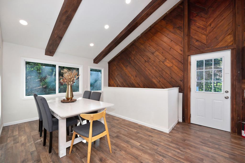3191 Fort Jim Road Placerville, CA 95667 - Photo 15 of 30 a view of a dining room with furniture and wooden floor
