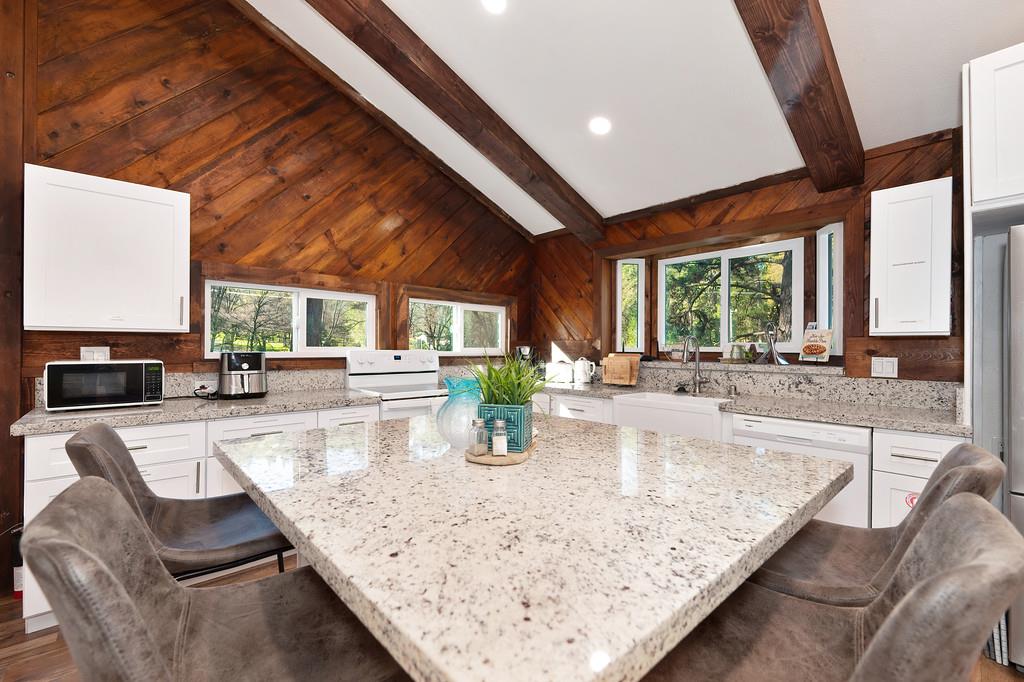 3191 Fort Jim Road Placerville, CA 95667 - Photo 20 of 30 a kitchen with dining table and chairs