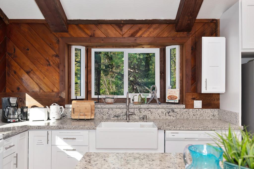 3191 Fort Jim Road Placerville, CA 95667 - Photo 21 of 30 a kitchen with a sink and a large window