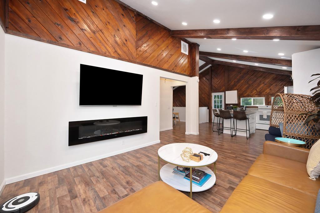 3191 Fort Jim Road Placerville, CA 95667 - Photo 24 of 30 a living room with furniture and a flat screen tv