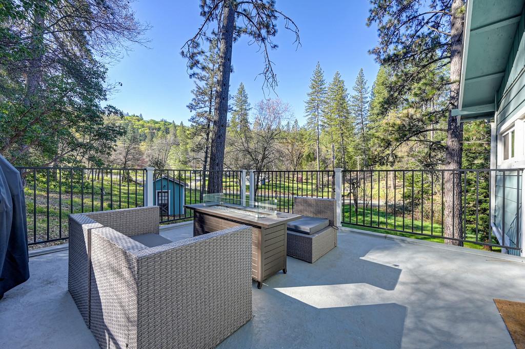3191 Fort Jim Road Placerville, CA 95667 - Photo 30 of 30 a view of a patio with couches chairs and a table