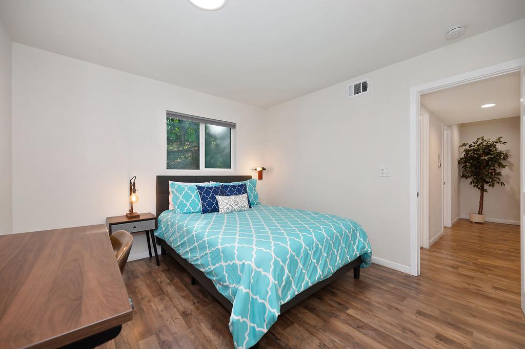 3191 Fort Jim Road Placerville, CA 95667 - Photo 10 of 30 a bedroom with a bed and a window