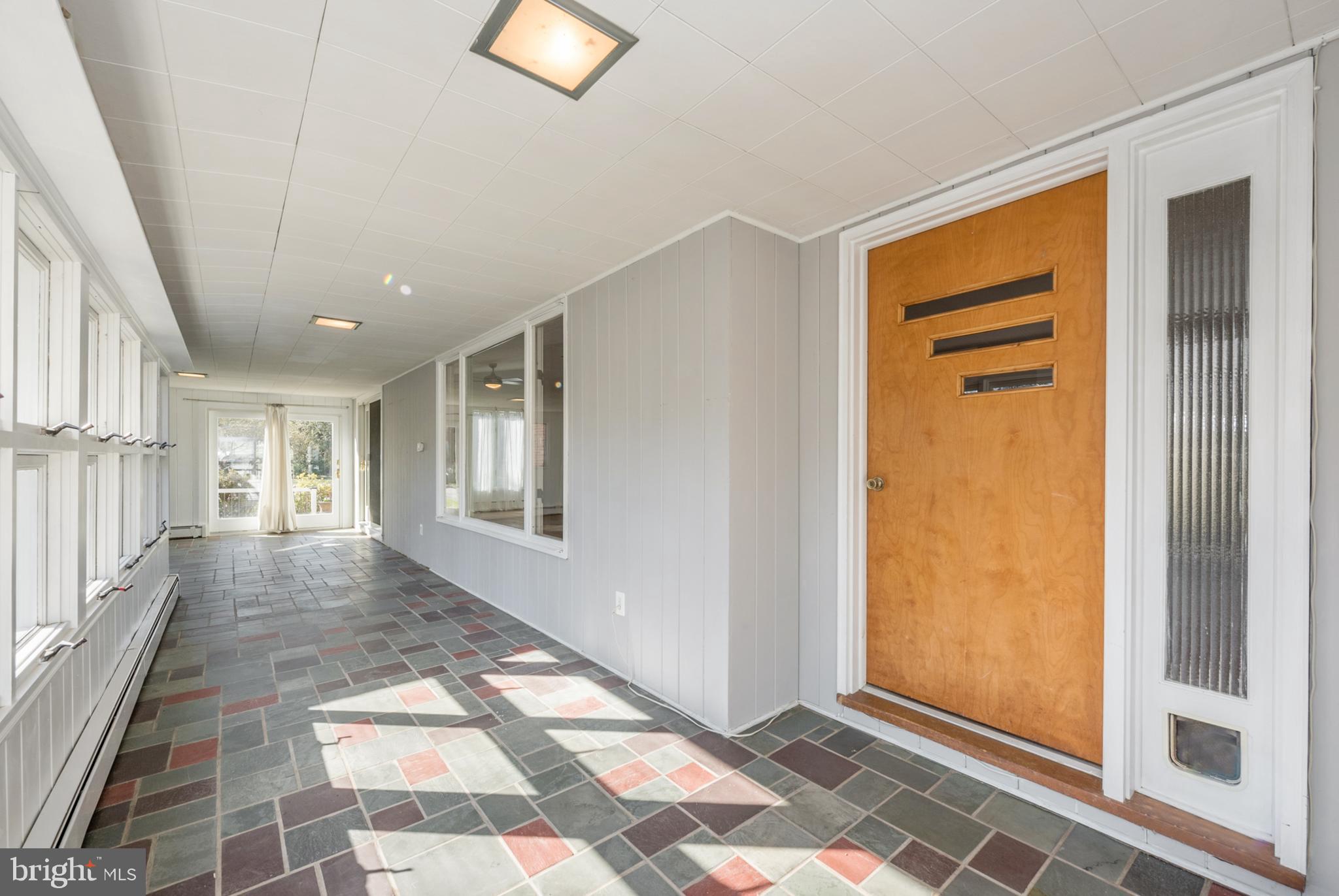 106 West Upper Ferry Road Ewing, NJ 08628 - Photo 4 of 25 Foyer and Sunroom