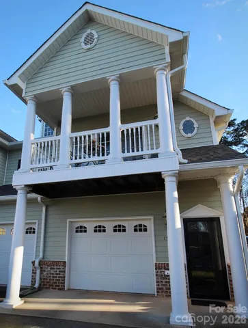 a front view of a house with balcony