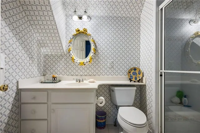 a view of a tree in a yard