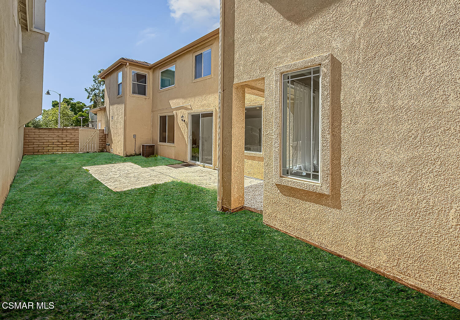 2511 Aurora Lane Simi Valley, CA 93063 - Photo 17 of 48 a yellow house with garden in front of it