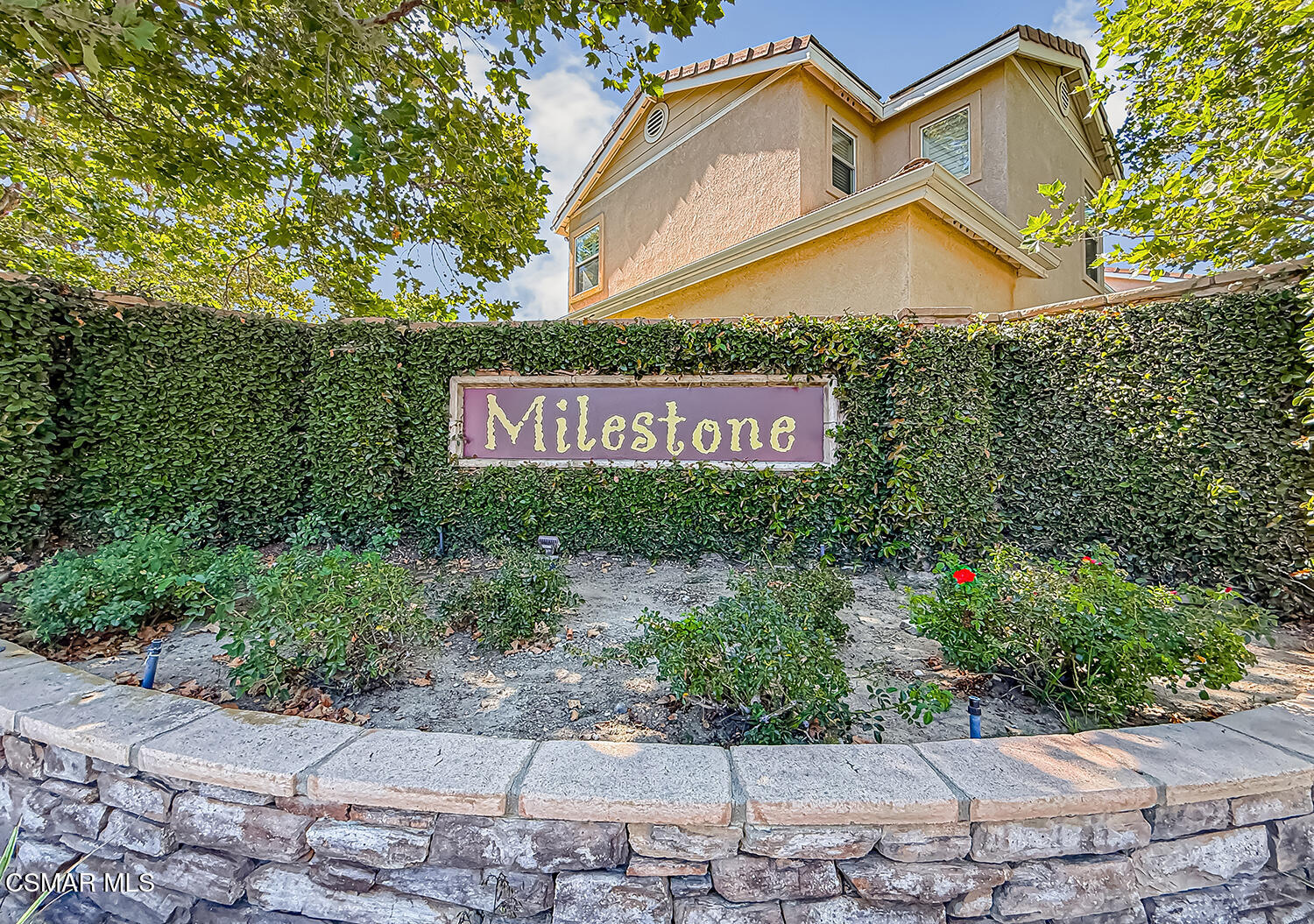 2511 Aurora Lane Simi Valley, CA 93063 - Photo 2 of 48 a street sign on a pole on a sidewalk