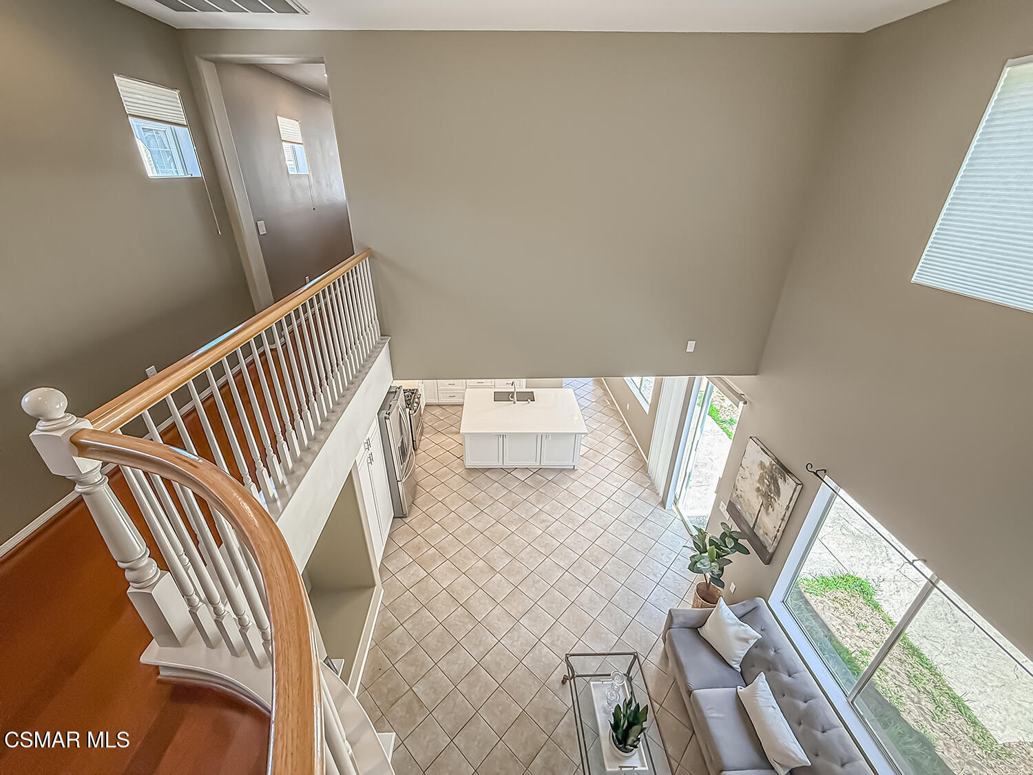 2511 Aurora Lane Simi Valley, CA 93063 - Photo 23 of 48 a view of a hallway with wooden floor and stairs