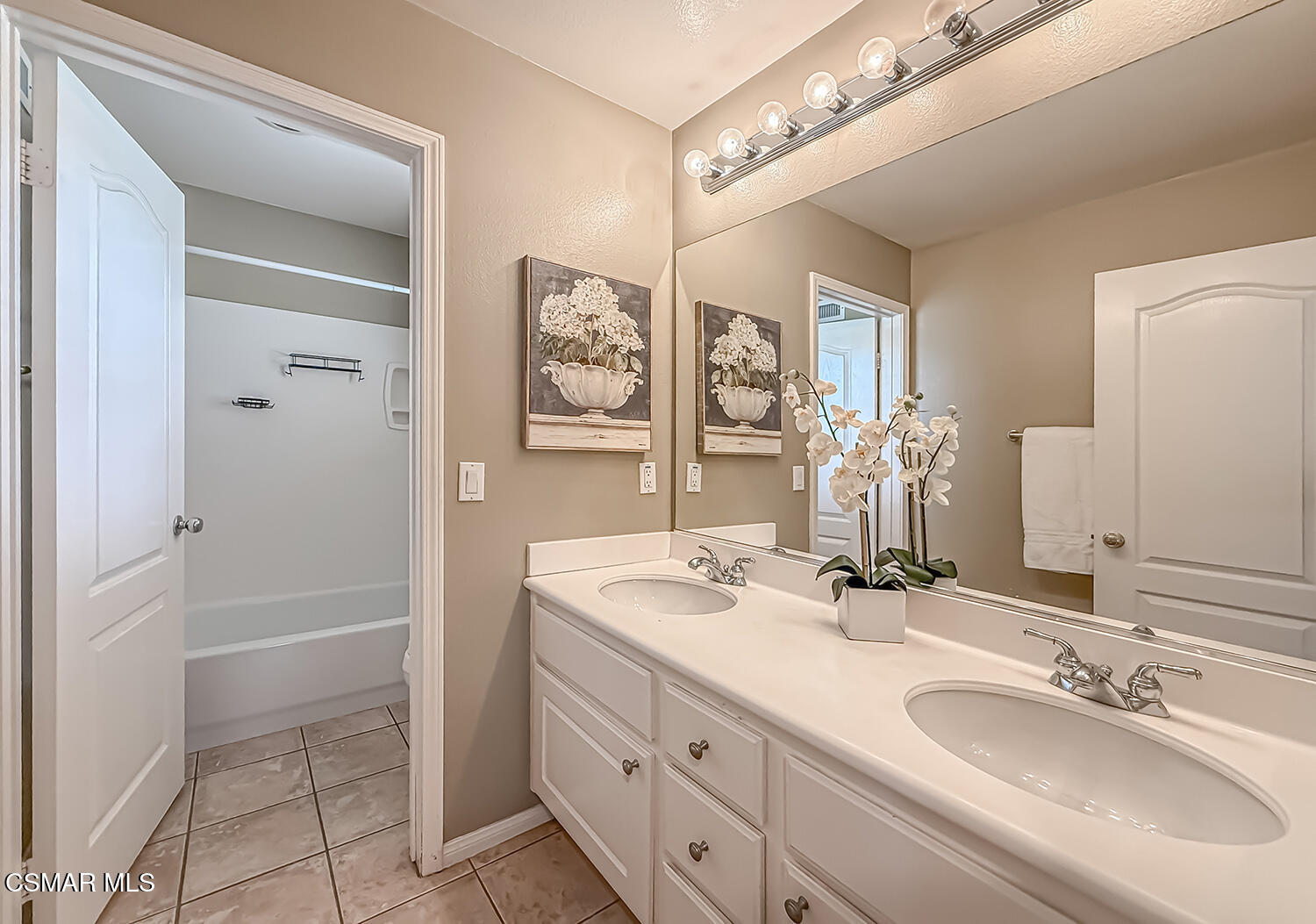 2511 Aurora Lane Simi Valley, CA 93063 - Photo 26 of 48 a bathroom with a sink vanity and a mirror