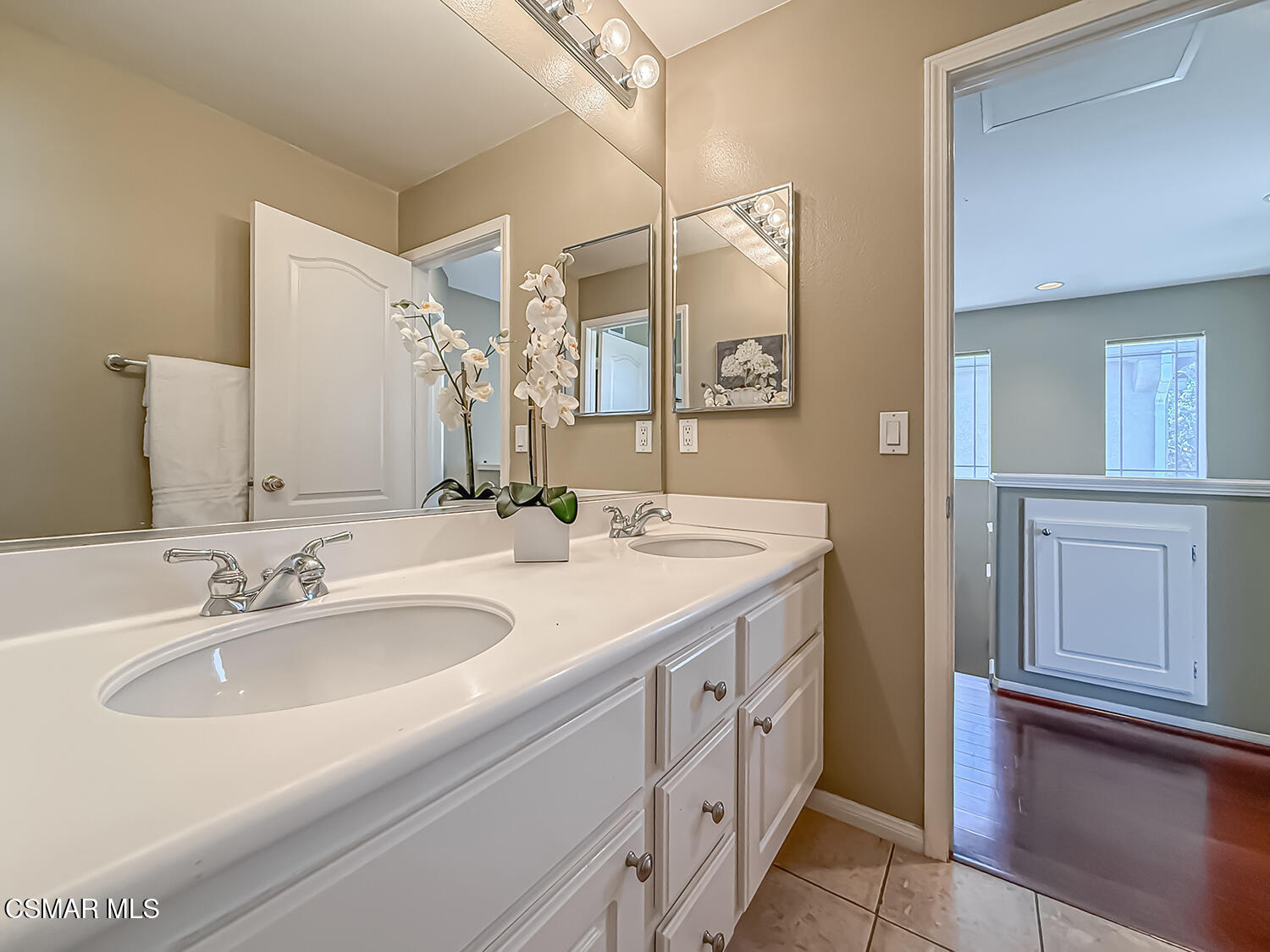 2511 Aurora Lane Simi Valley, CA 93063 - Photo 28 of 48 a bathroom with a double vanity sink and mirror