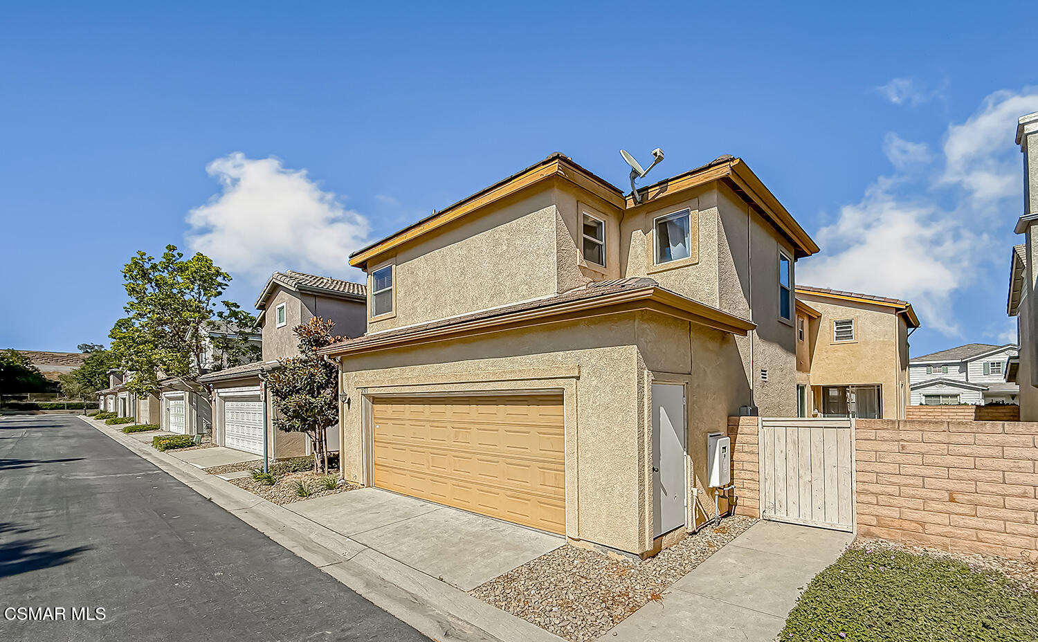 2511 Aurora Lane Simi Valley, CA 93063 - Photo 41 of 48 a front view of a house with a yard and garage
