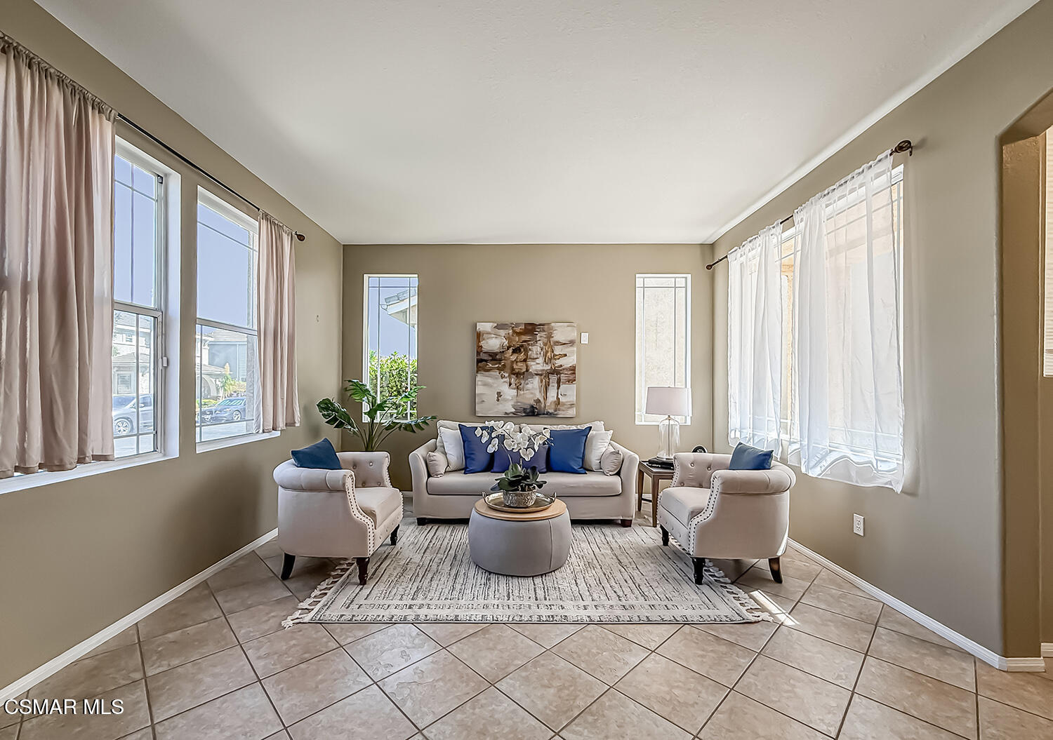 2511 Aurora Lane Simi Valley, CA 93063 - Photo 10 of 48 a living room with furniture and a potted plant